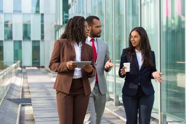 team diverse colleagues their way office